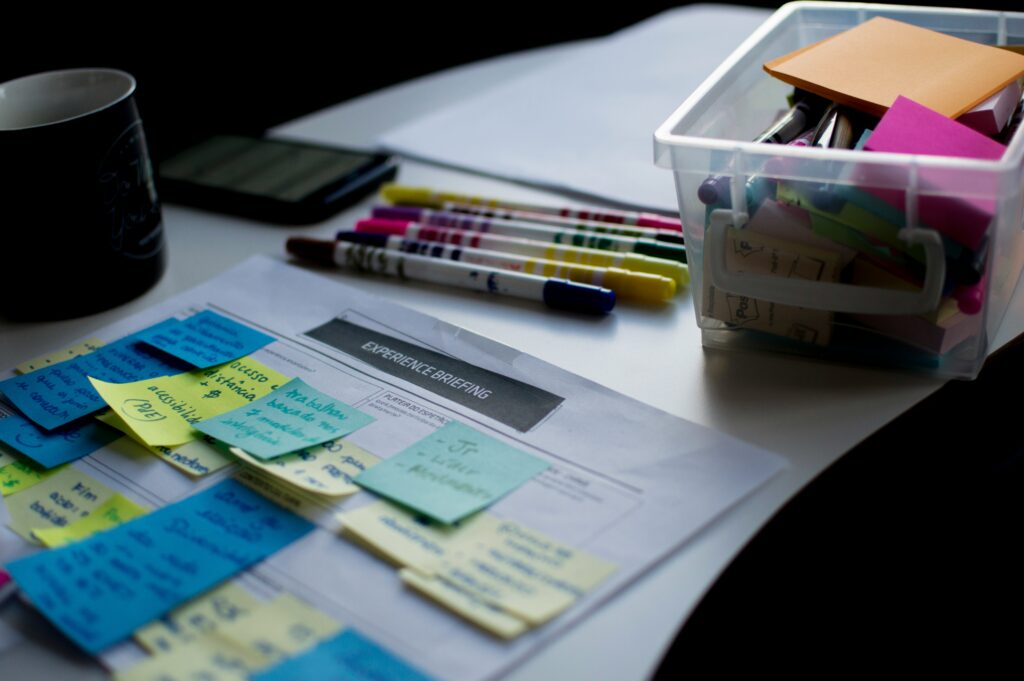Small business owner planning a home business launch in a notebook